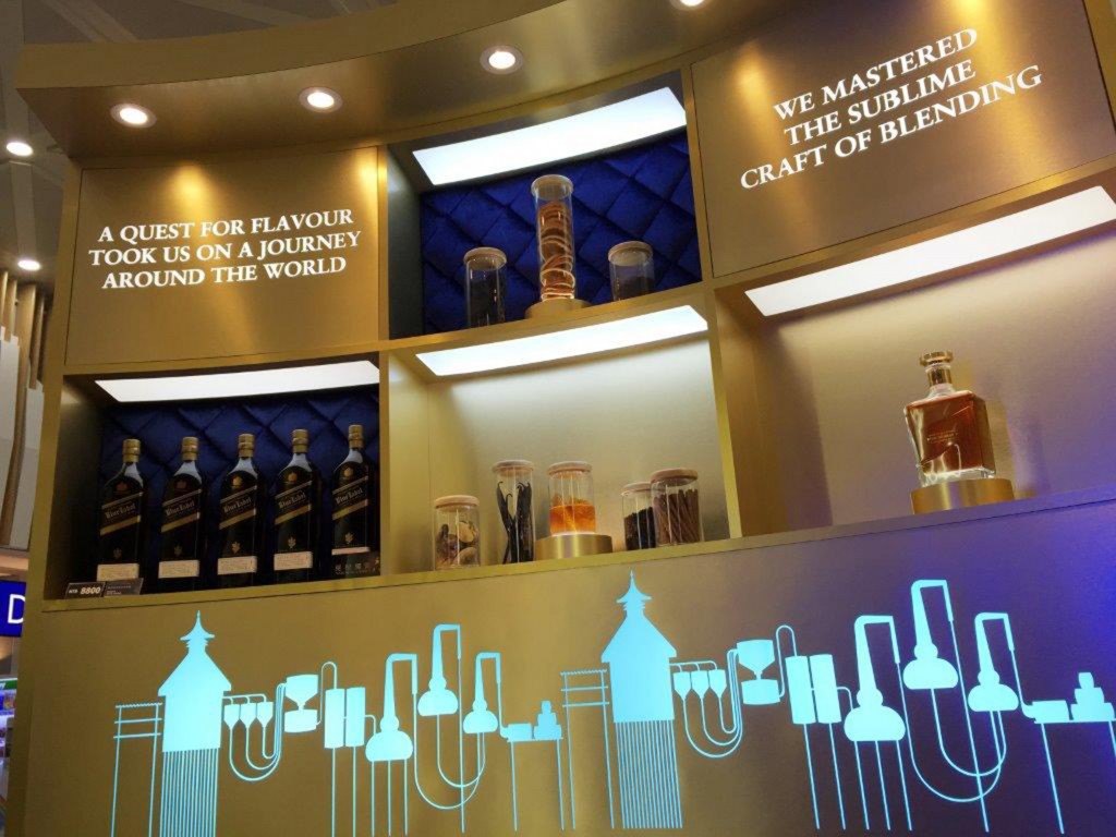 Luxury blends, including JOHNNIE WALKER BLUE LABEL, on display in the Boutique